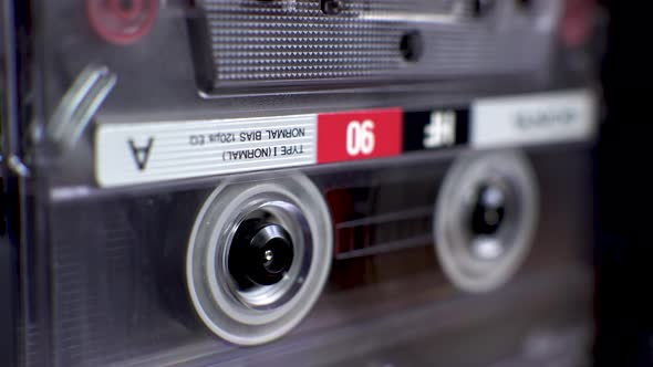 vintage audio cassette fast forwarding and then playback in tape deck