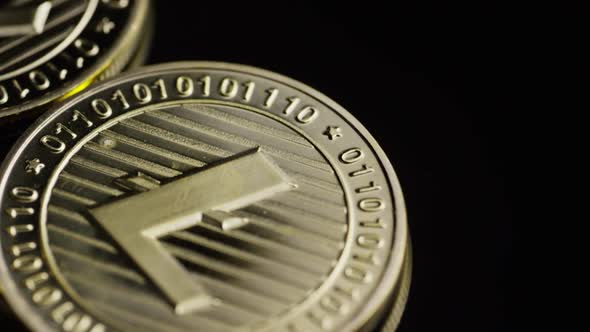Rotating shot of Bitcoins (digital cryptocurrency) - BITCOIN LITECOIN 214 alt