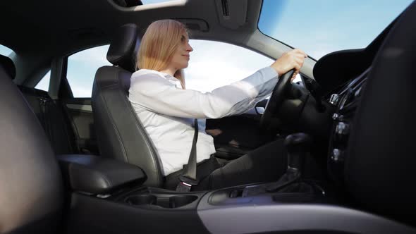 Woman Driving Car alt