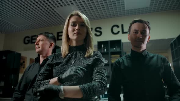 Team of Professional Barbers in Salon alt