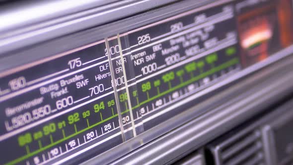 Tuning Analog Radio Dial Frequency on Scale of the Vintage Receiver alt