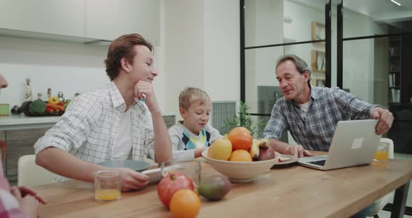 Mature Parents with Their Two Sons in the Modern alt