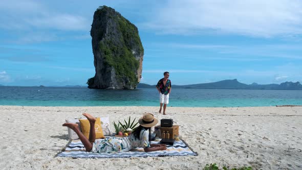 Koh Poda Beach Krabi Thailand Couple Asian Woman and European Men Walking on the Tropical Beach of alt
