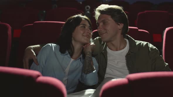 Portrait of Loving Couple in Cinema alt