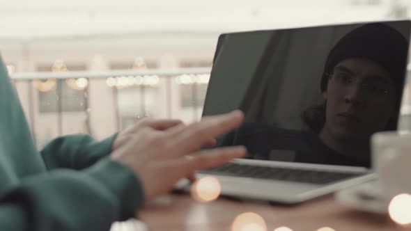 Young Man Typing on Computer Keyboard alt