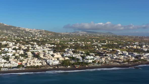 Aerial view of Kamari beach on Santorini island alt