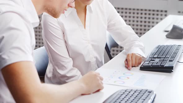 Diverse team of young professionals is working in the phone support office. alt