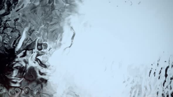 Texture Waves of Black Water or Oil As a Background with Empty Space for Titles or Words alt