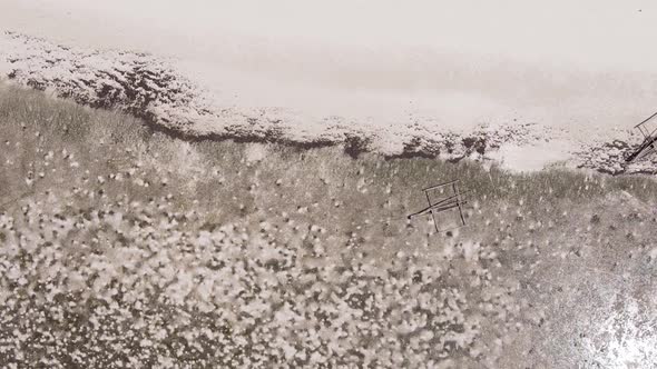 Vertical Video of Low Tide in the Ocean Near the Coast of Zanzibar Tanzania Aerial View alt