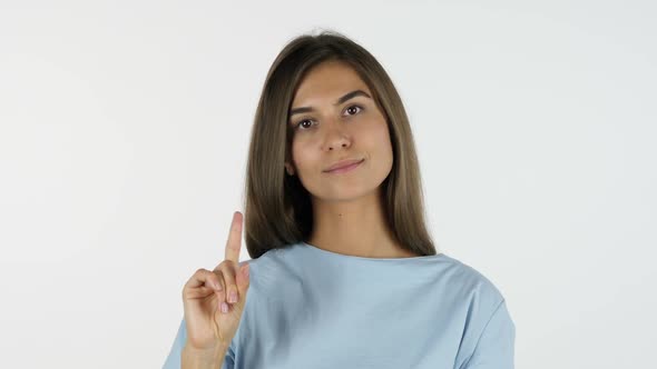 Waving Finger, No, Denying Beautiful Girl, White Background in Studio alt