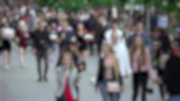 Silhouettes of People Walking in a Crowd Slow Motion alt