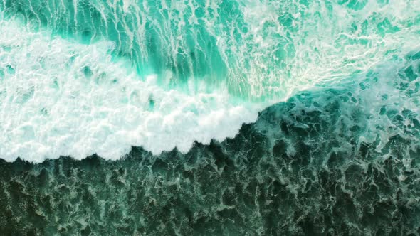 Aerial looking down onto waves