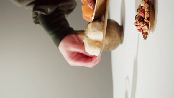 Vertical Video of Turkish Tea and Sweets Hot Drink in Traditional Armudu Glass Closeup alt