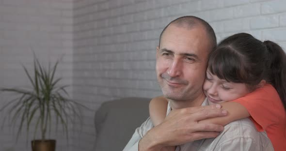 Family recreation with father indoor. alt