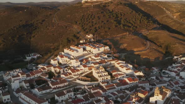 Aerial drone view of Sanlucar de Guadiana in Spain, from Alcoutim in Portugal alt