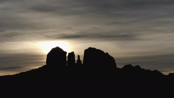 Mystical Sun and Clouds Behind Sedona Rock Formations Time Lapse alt