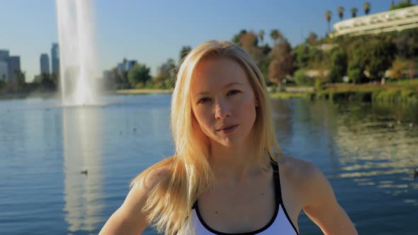Athletic Woman Jogging In The Park alt