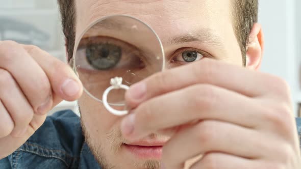 Examining Ring Through Loupe alt