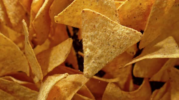 Super Slow Motion Shot of Tortilla Chips Flies After Being Exploded at 1000Fps alt