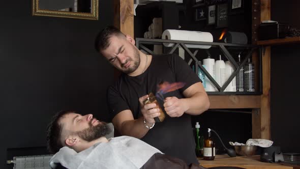 Barber Heating Razor Before Shaving