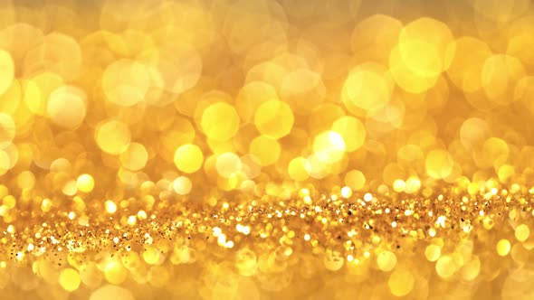 Super Slow Motion Shot of Golden Glitter Background at 1000Fps. alt