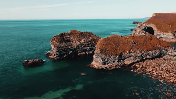 Seascape of the Atlantic Ocean bay with rocks above the water. Aerial view.