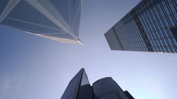 Looking up to High-rise Buildings Skyscrapers Futuristic Architecture  alt