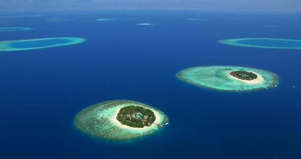 Aerial drone view of scenic tropical islands in the Maldives. alt