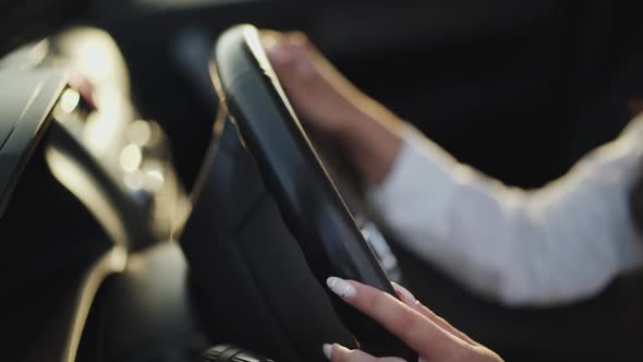Close View of Female Fingers Caress and Knock Car Handlebar alt
