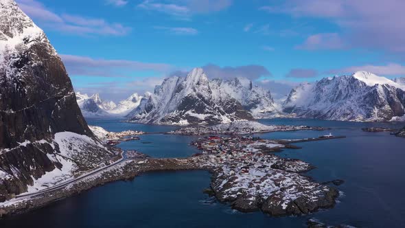 Reine Village and Mountains in Winter. Lofoten Islands, Norway. Aerial View alt