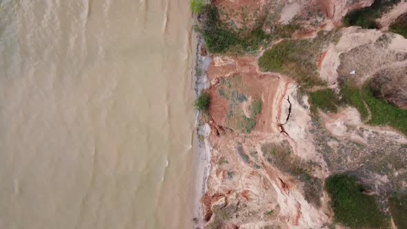 Vertical Aerial Top Down View Shot and Looking Down on Dnipro River and Hills