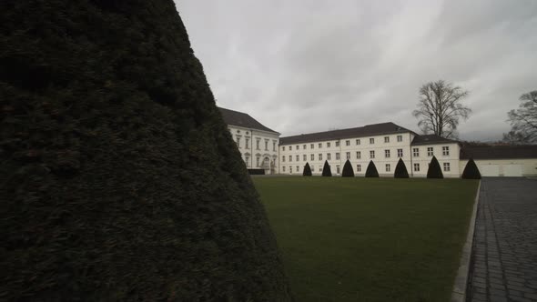 Black Limousine Passing in Front of Schloss Bellevue alt