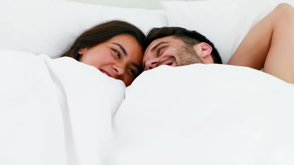 Young Couple Sleeping In Bed Under Blanket Stock Photo, Picture And Royalty  Free Image