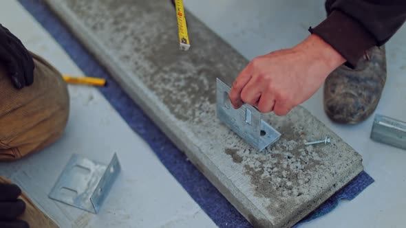 Builders work with instruments alt