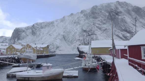 Winter Small Fishing Harbor Among the Mountains