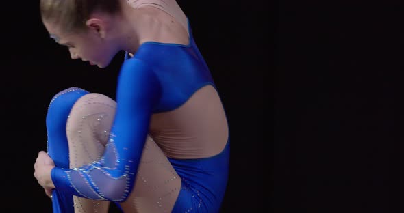 Aerial Gymnastics Performance By Two Young Girls Spinning in the Air alt