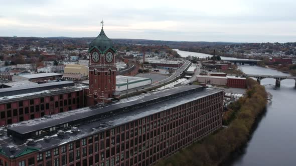 Exterior Of Museum With Ayer Mill Clock Tower Along Merrimack River At Early Morning In Lawrence, Ma alt