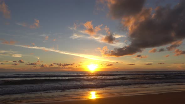 sunset over the sea alt