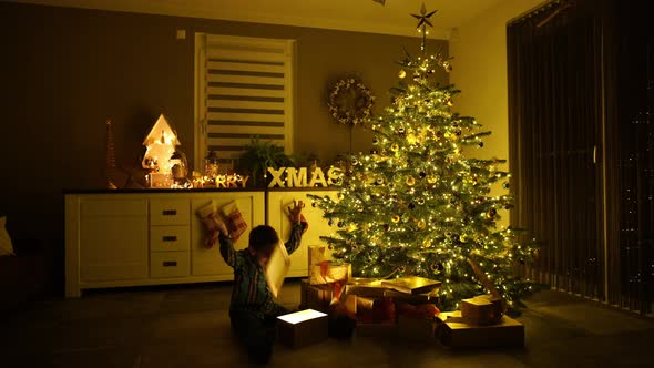 Boy With Lighted Christmas Present