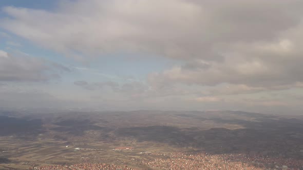 Beautiful colors of sky above the valley 4K aerial video alt