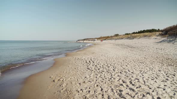 Sandy Beach of Melnrage in Klaipeda on a Sunny Warm Day
