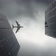 Airplane flies over business skyscrapers - VideoHive Item for Sale