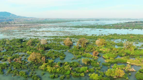Aerial: flying over Don Det and the 4000 islands Mekong River in Laos alt