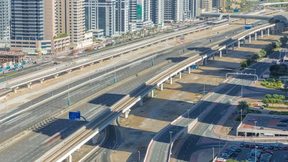 Sheikh Zayed Road Traffic in Dubai Marina and Jumeirah Lakes Towers Districts Timelapse alt