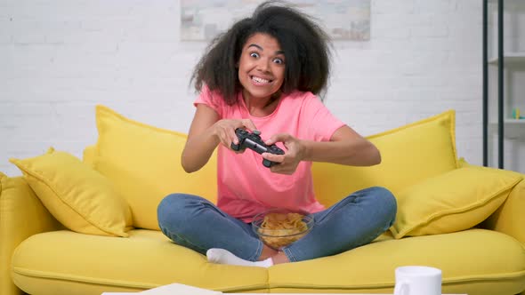 Woman playing video game.