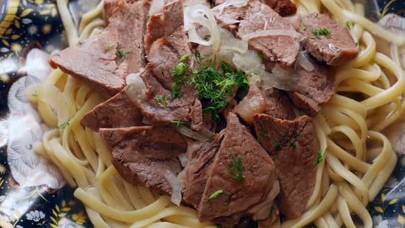 Etnic Kazakh Food  Beshbarmak Meat with Noodles