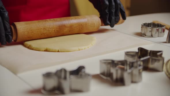 Rolls Out the Dough on the Kitchen Table alt