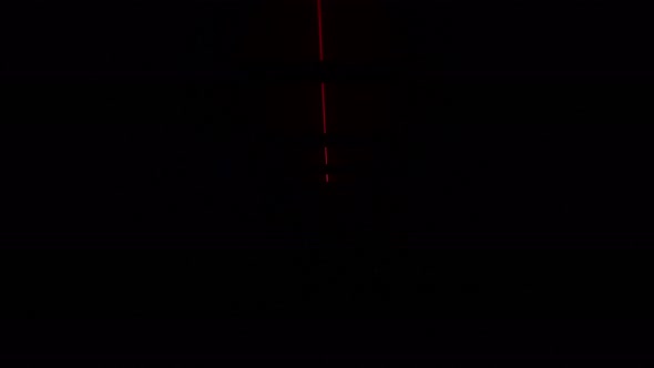 A Woman Experiences Fear and Panic While Walking in a Dark Corridor alt