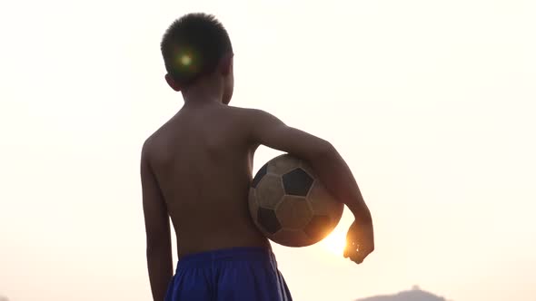 Back Of Boy Holding Soccer Ball By Yoycg Videohive