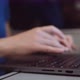 Closeup of Womans Hands Typing on a Laptop While Going By Train in the Evening - VideoHive Item for Sale